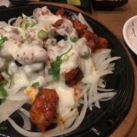 Burning Chicken With Mozzarella Cheese · Spicy. Stir-fried burning hot chicken with fresh mozzarella cheese on the top. comes with ri...