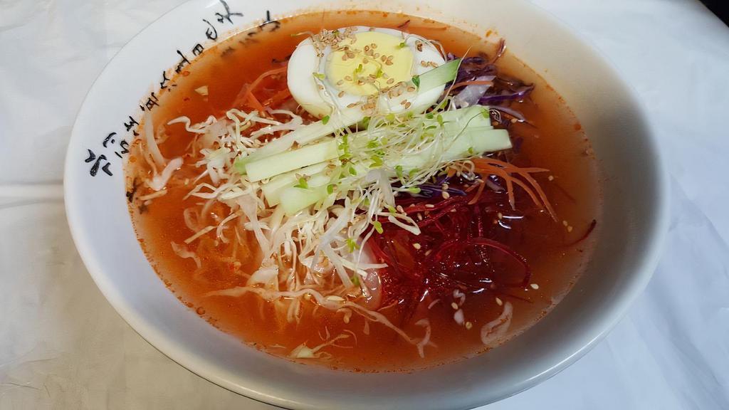 Cold Jjol Myun · Cold soup inside korean chewy noodle with vegetables and boiled egg. Spicy