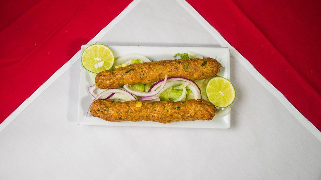 Chicken Seekh Kabab · Ground chicken seasoned with fresh herbs and spices sauteed.