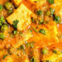 Matar Paneer - Full · Fresh homemade cheese cubes cooked with green peas in a mildly spices sauce.