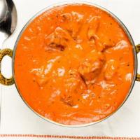 Butter Chicken · Chicken cooked with onion, tomato sauce and heavy cream.