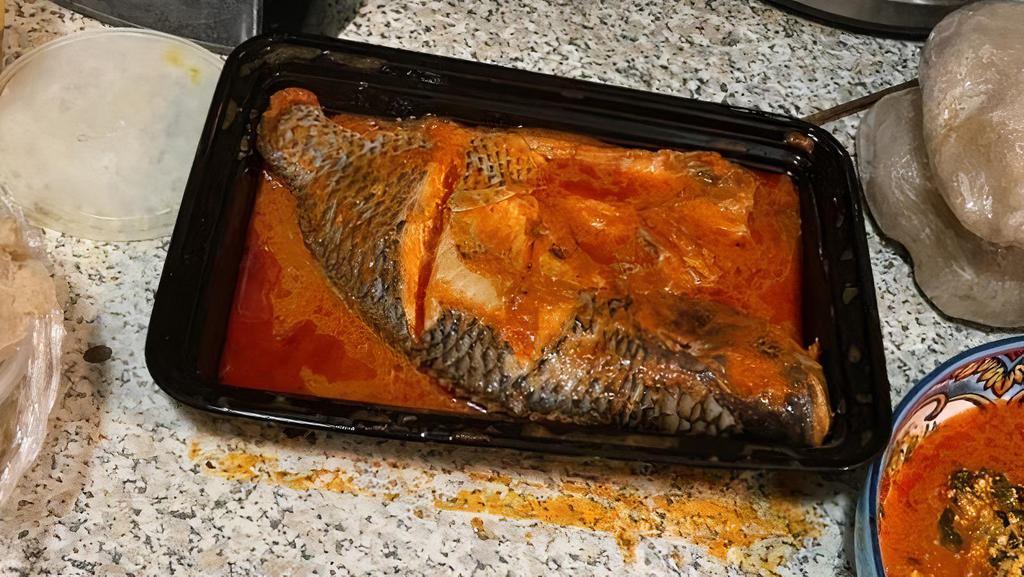 Grilled Fish (Whole Tilapia) · Tilapia prepared with assorted vegetables.