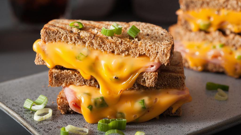 American Grilled Cheese · American grilled cheese sandwich on customer's choice of bread.