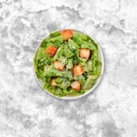 Caesar Salad · Romaine lettuce, house croutons, and vegan parmesan cheese tossed with vegan caesar dressing.