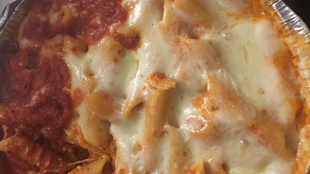 Baked Ziti · Ziti with mozzarella and tomato sauce baked to perfection in our oven.