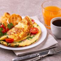 Western Omelette Platter · An omelette served with scrambled eggs, ham, bell peppers and onions. Served with home fries...