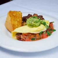 Monterey Omelette Breakfast Platter · An omelette served with scrambled eggs, bacon, avocado and pepper jack cheese with salsa. Se...