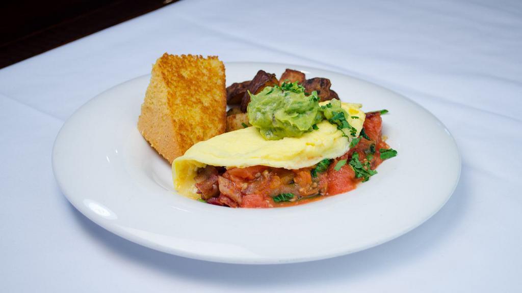 Monterey Omelette Breakfast Platter · An omelette served with scrambled eggs, bacon, avocado and pepper jack cheese with salsa. Served with home fries & toast.