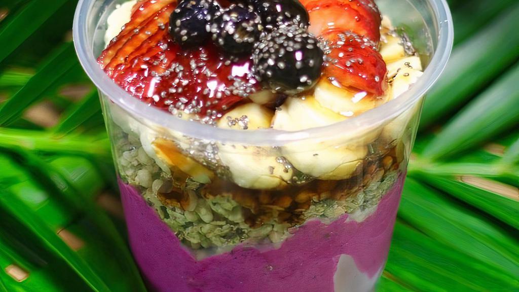 Pitaya Bowl · Blend: Organic Pitaya,  coconut milk, Strawberries, Banana, and Pineapple
Topping: Fresh Banana,  Strawberries, Blueberries, Chia Seeds, and Honey