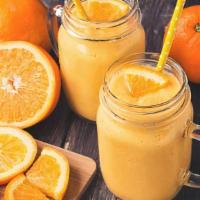 Orange Creamsicle Smoothie · Fresh orange, orange juice, organic soymilk, vegan soy cream, pineapple, honey