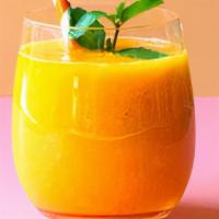 Pineapple Mango Smoothie · Local pineapple, mango, orange juice, and honey
