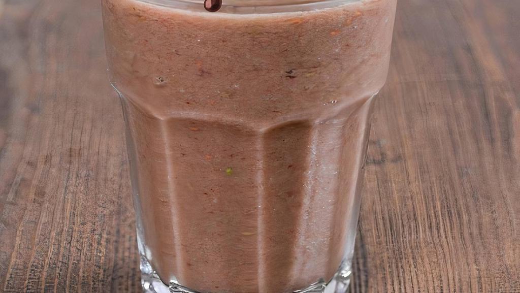 Nutella Dipped Strawberry Smoothie · Nutella, strawberries, organic soymilk, chocolate chips, vegan soy ice cream, and honey