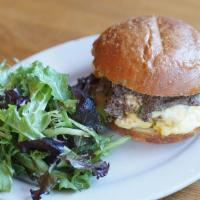 Veggie Egg Sandwich · scrambled eggs, mushroom purée, goat cheese, scallions on toasted challah roll