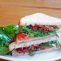 Blt Sandwich · Thick cut bacon, romain lettuce and tomatoes with habanero mayo on toasted challah roll.