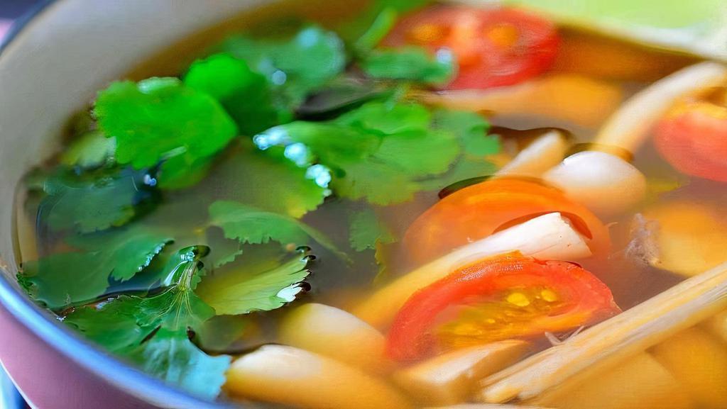 Tom-Yum Soup · Spicy. Lemon grass, mushrooms, simmered in a veg broth vegetable broth.