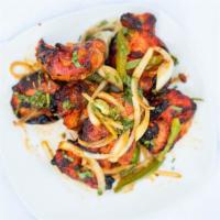 Chicken Tikka · CUBES OF CHICKEN MARINATE IN RED SPICY SAUCE COOKED IN CHARCOAL OVEN
