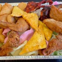Pu Pu Platter For 2  · Chicken wing, egg roll, cheese dumplings, bbq spare ribs, shrimp toast, fried scallop, fried...