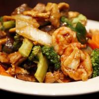 Triple Delight · Chicken, beef, shrimp, broccoli and Chinese vegetables. Served with rice.