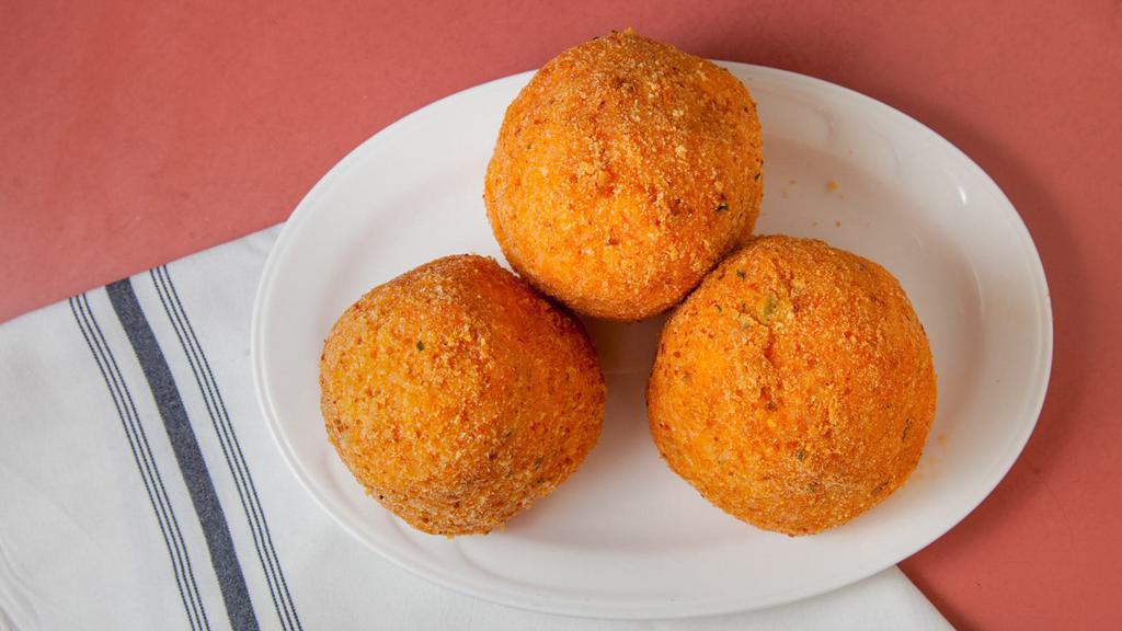 Rice Ball · One rice ball. served with italian tomato sauce.