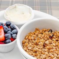 Yogurt And Granola Bowl · Granola with fresh berries and Greek yogurt.