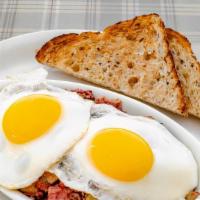 Sundays On The Farm · Homemade corned beef hash with 2 eggs any style and choice of toast.