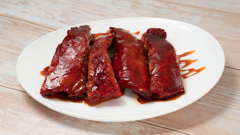 B-B-Q Spare Ribs  · A cut of meat from the bottom section of the ribs. ribs that have been broiled roasted or grilled.