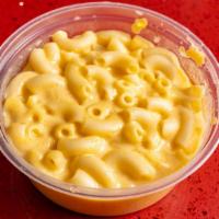 Mac And Cheese · Macaroni pasta in a cheese sauce.