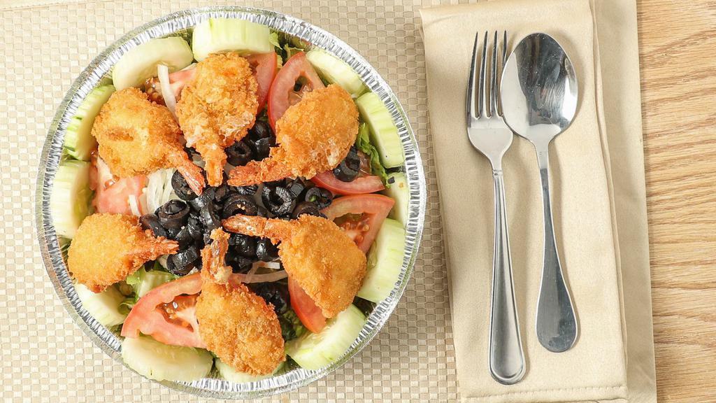 6 - Pcs Jumbo Shrimp Salad · Jumbo shrimp with dressing on the side and a bottle of water or can of soda