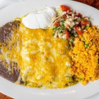 Enchiladas Verdes · Vegetarian. Three corn tortillas filled with cheese & sautéed vegetables, topped with tomati...