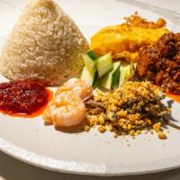 Nasi Lemak · National dish of Malaysia. A great introduction to Malaysian cuisine as you can sample vario...