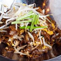 Char Kway Teow · Penang’s Official late night craving. Contain:
eggs, chive, soy sauce blend, chili paste, an...