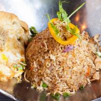 Indonesian Nasi Goreng Fried Rice · Umami tastes perfect thanks to our home-made special sambal onion, carrot, and peas with fri...