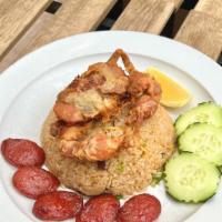 Soft Shell Crab Herbal Rice · Crispy soft-shell crabs served with crab paste rice, raisins, goji berries, shiitake mushroo...