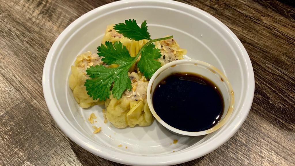 Thai Steamed Dumplings · Grounded chicken and shrimp, water chestnuts and shiitake mushrooms, served with sweet soy-vinaigrette sauce.