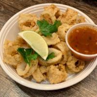 Crispy Calamari · Crispy-fried calamari, served with sweet chili sauce.