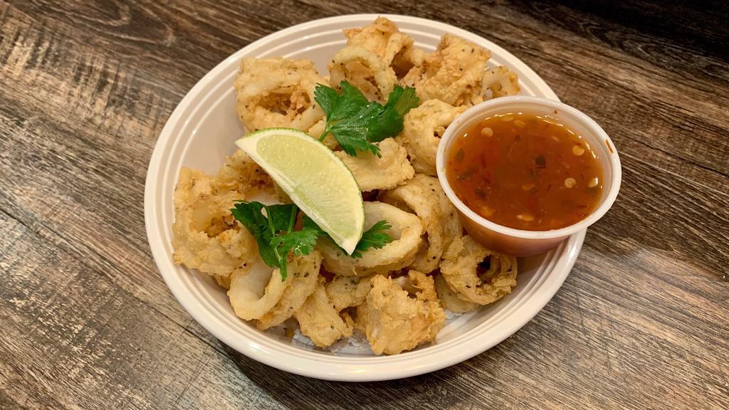 Crispy Calamari · Crispy-fried calamari, served with sweet chili sauce.