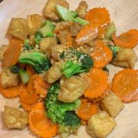 Broccoli And Tofu (V) · Stir-fried broccoli, tofu and carrots in delight sauce. Vegetarian.