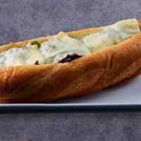 Philly Steak & Cheese · Steak, green peppers, onions and classic American cheese.