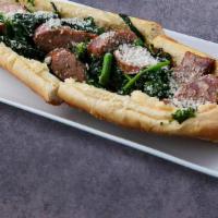 Broccoli Rabe With Sausage · Broccoli Rabe and sausage with grated Parmesan.