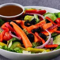 Fresh Garden · Fresh lettuce, tomatoes, green peppers, red onions, cucumbers, and black olives.
