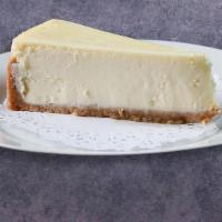 Ny Cheesecake · Classic New York cheesecake with a creamy satiny texture.