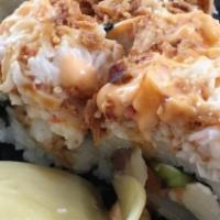 Baby Roll · Top: crab, crispy onion, spicy sauce, teriyaki sauce inside: smoked salmon, avocado, cream c...