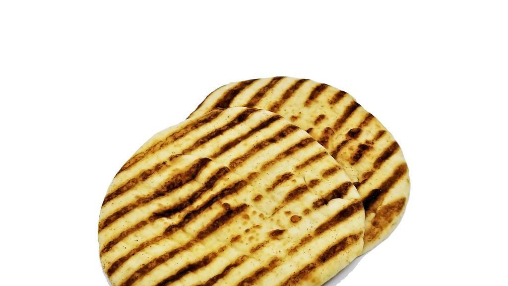 Pita · Soft eight inch pita on the side chopped in 4 pieces