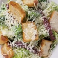 Classic Caesar Salad · House Caesar dressing with croutons, romaine, shredded Parmesan and anchovy fillets.