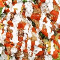 Buffalo Chicken Salad · Chopped Romain with Shredded Cheddar and Diced Tomatoes tossed in our House Ranch Dressing a...