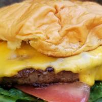 The Classic · Four ounce la frieda beef patty, lettuce, tomato, and American cheese.