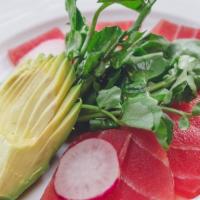 Tuna Sashimi And Avocado · Thinly sliced yellow fin tuna, avocado, watercress, sesame-soy dressing.