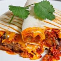Spicy Pork Burrito · Berkshire pork shoulder sautéed with our spicy house-made Korean BBQ sauce, wrapped in a flo...