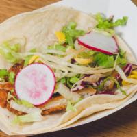 Spicy Fish Taco · Lightly battered whiting, served on corn tortillas with bean sprouts, red leaf lettuce, soy ...