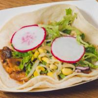 Vegan Spicy Mushroom Taco · Oyster & button mushrooms sautéed with our spicy house-made Korean BBQ sauce, served on corn...